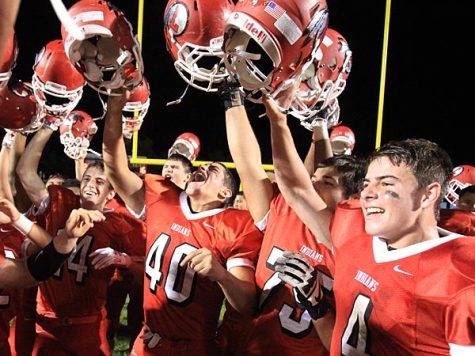 Lenape celebrates its 24-16 victory over rival Cherokee