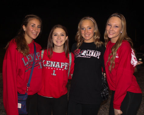 From left to right: Aliza Band, Ashley Thompson, Sarah Hughart, and Camille Davis, all class of 2018. What do you like most about Lenape football games? "It brings us all together"- Aliza Band "And the crowd, we all stick together"- Ashley Thompson 