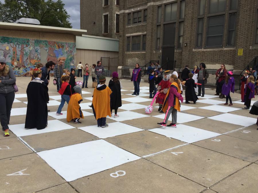 Children play "Wizard's Chess"