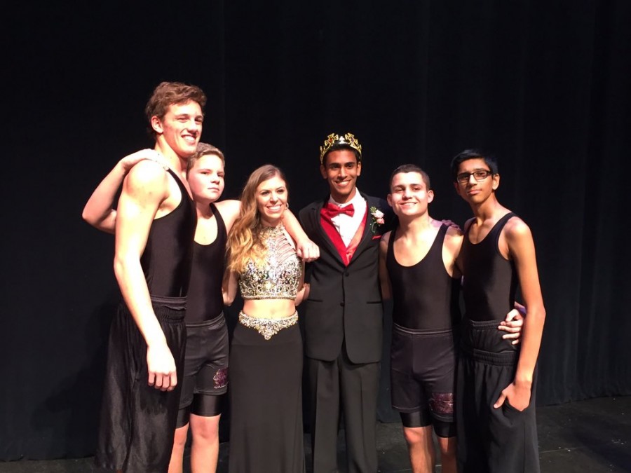 Alex Trauger (17), Trevor Montgomery (19), escort  Julia Wietrzychowski (16), winner Kavi Munjal (16), Christian Ramoundos (17), and Jayen Patel (18) pose for their victory shot.