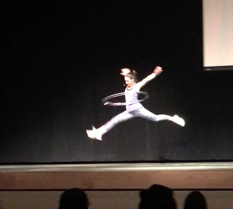 Amelia Toner (18) performing with her hula-hoops