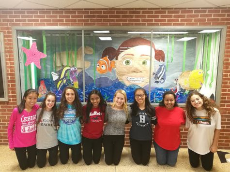 Juniors Olivia Cao, Emily Michnowski, Ryann Long, Saumya Mavuri, Jackie Zak, Claire Zhang, Dipabali Jana, Liana Demarco, Claire Stridick (not pictured), and Gillian Cortese (not pictured) worked together to transform the A Hall showcase into the fish tank in Finding Nemo.