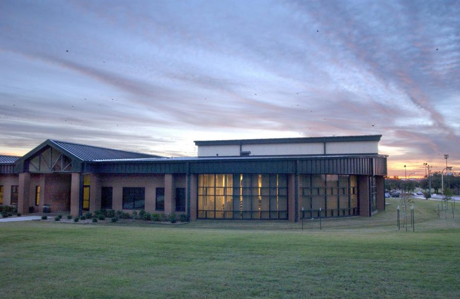 the-sun-rising-over-the-health-and-wellness-center-at-sheppard-afb-tx-on-oct-238571-1600