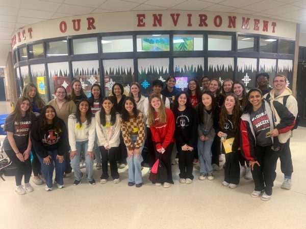 NHS Students Visit Elementary Schools for Read Across America