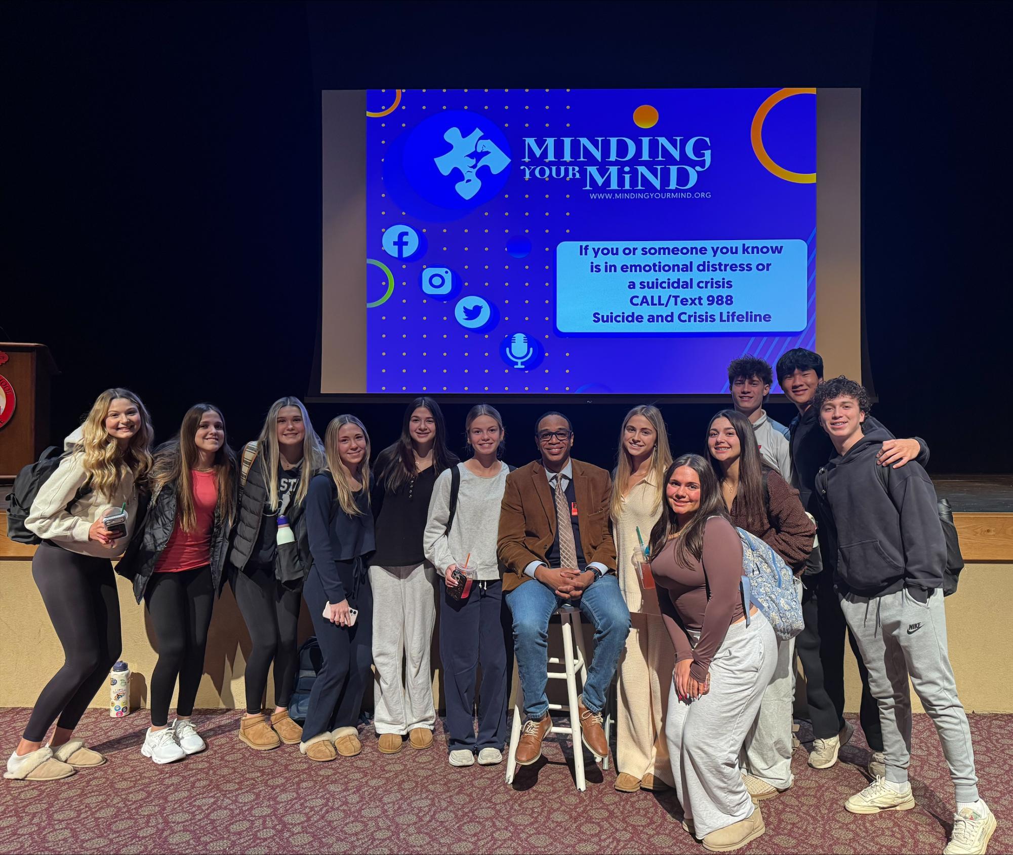 Students with the guest speaker, Jordan, from Minding Your Mind.